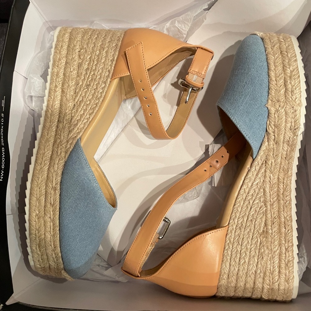 Never worn Ninewest wedges.